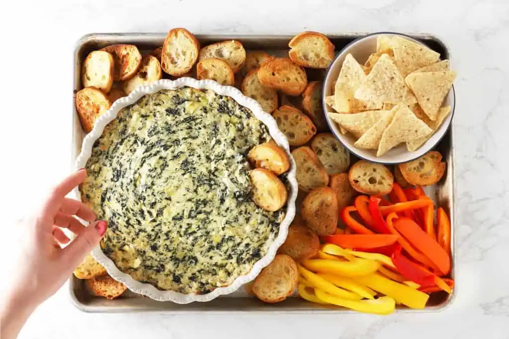 The best spinach artichoke dip, toast, chips and peppers.