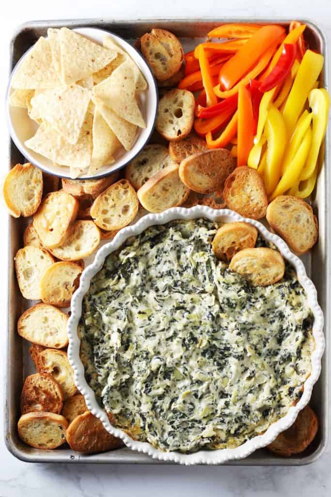 The best spinach artichoke dip, toast, chips and peppers.