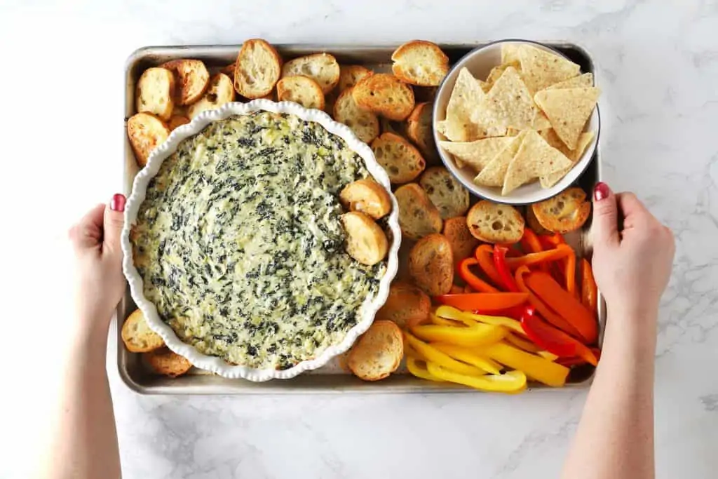 The best spinach artichoke dip, toast, chips and peppers.