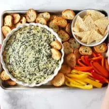 The best spinach artichoke dip, toast, chips and peppers.