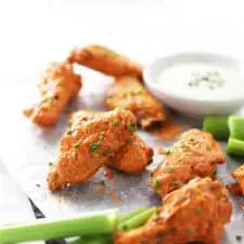 Air fryer buffalo wings with chives.