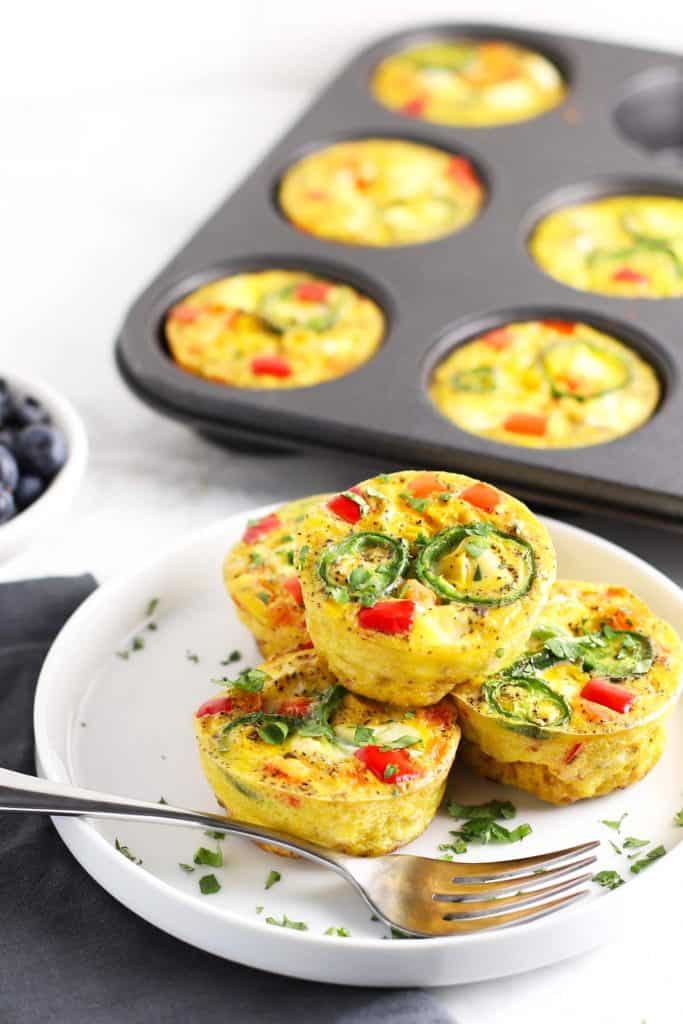 Healthy southwest egg cups on white plate. 