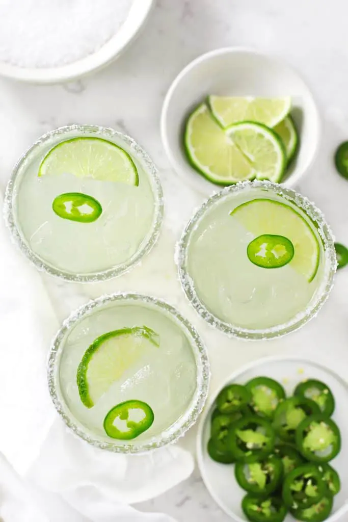 Three spicy margaritas in glasses.