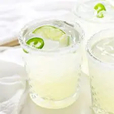 Three spicy margaritas in glasses.