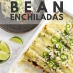 Vegetarian black bean enchiladas in a white dish.