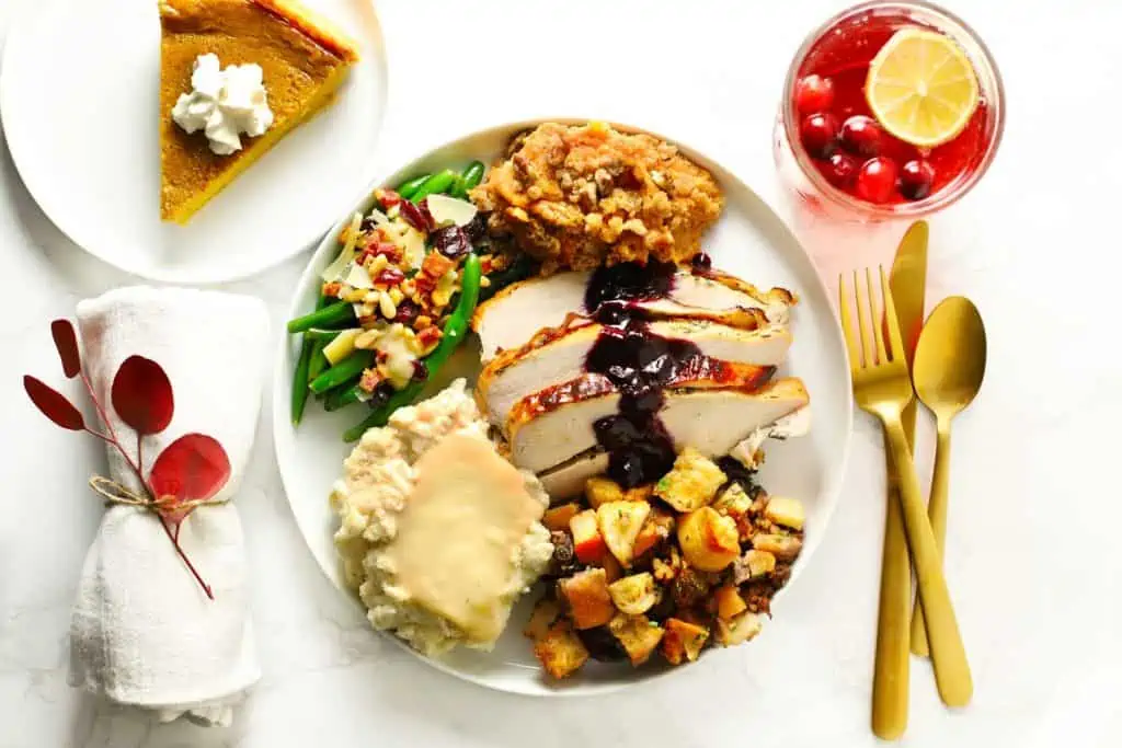 Make-ahead Thanksgiving meal on white plate.