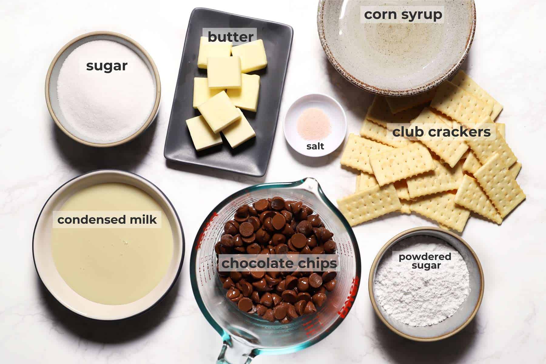 Cookie bar ingredients on marble counter. 