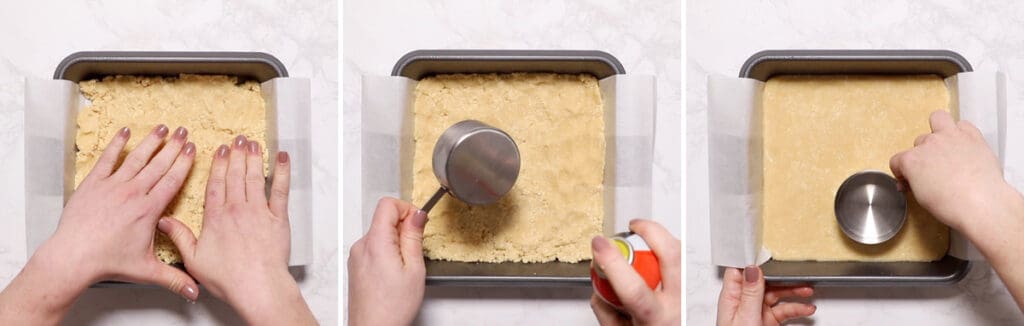 Two hands pressing dough into baking dish. 