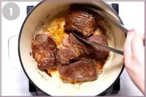 Meat being seared in Dutch oven.