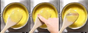 A wooden spoon dipped in lemon curd.