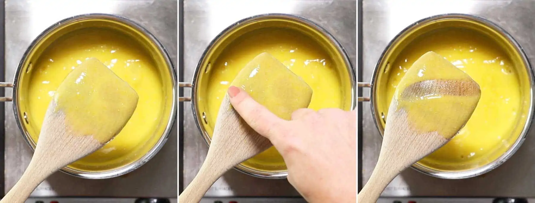 A hand drawing a line down the back of a wooden spoon.