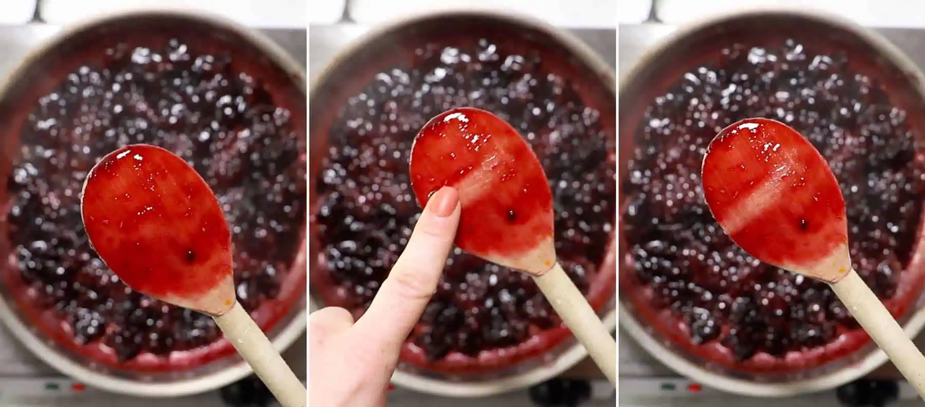 A wooden spoon dipped in cherry compote.