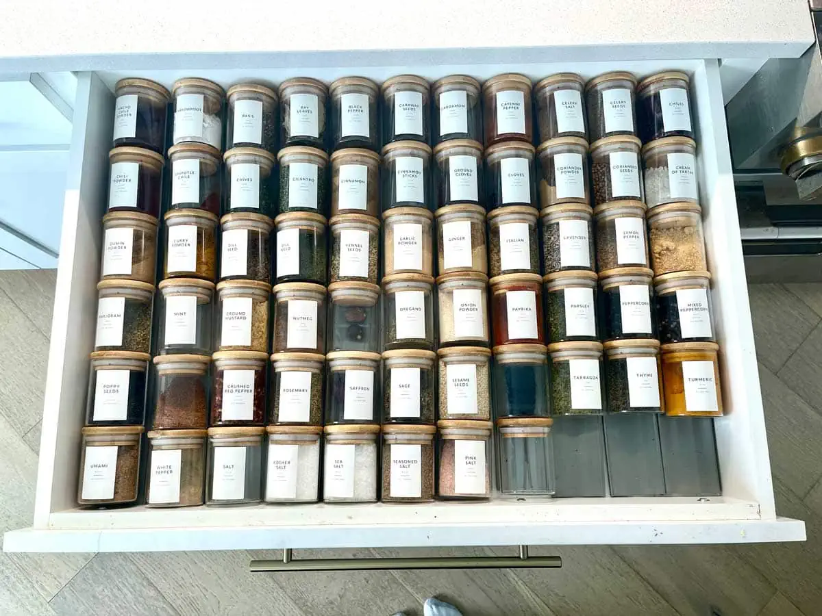 Spices organized in a drawer.
