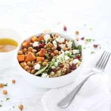 Sweet potato and quinoa salad in white bowl.