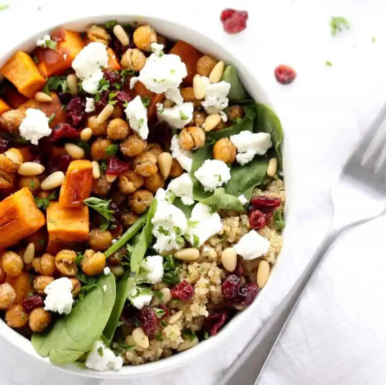 Sweet potato and quinoa salad in white bowl.